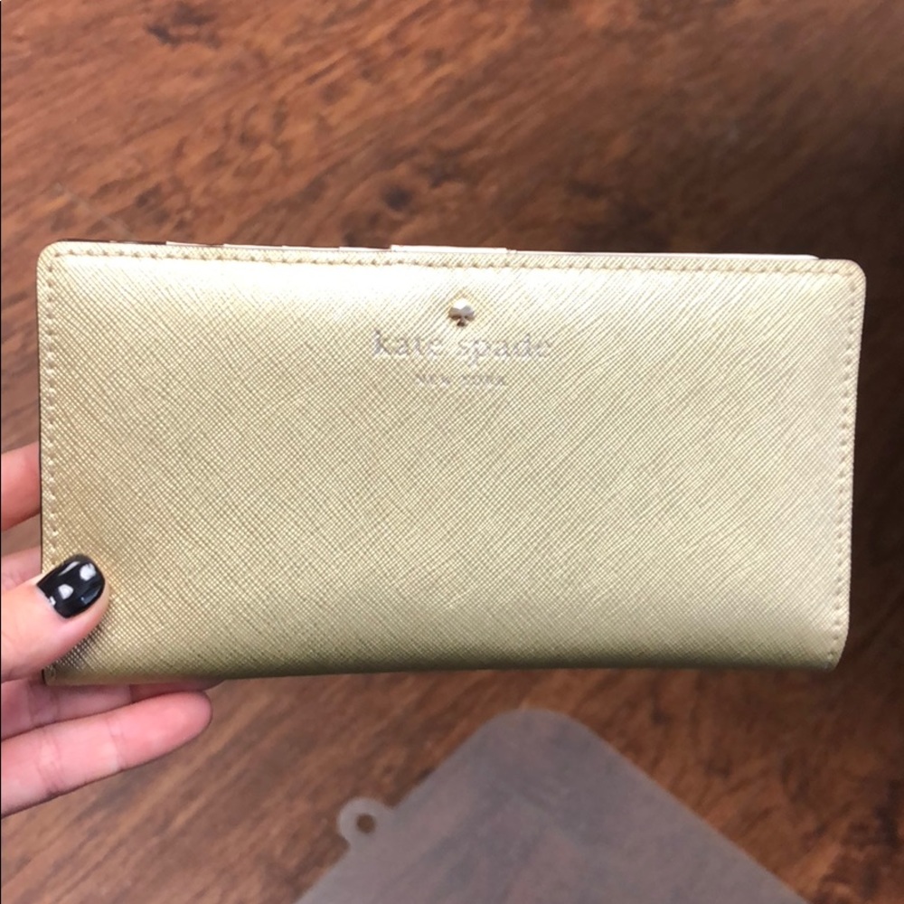 Kate Spade gold wallet, never used.